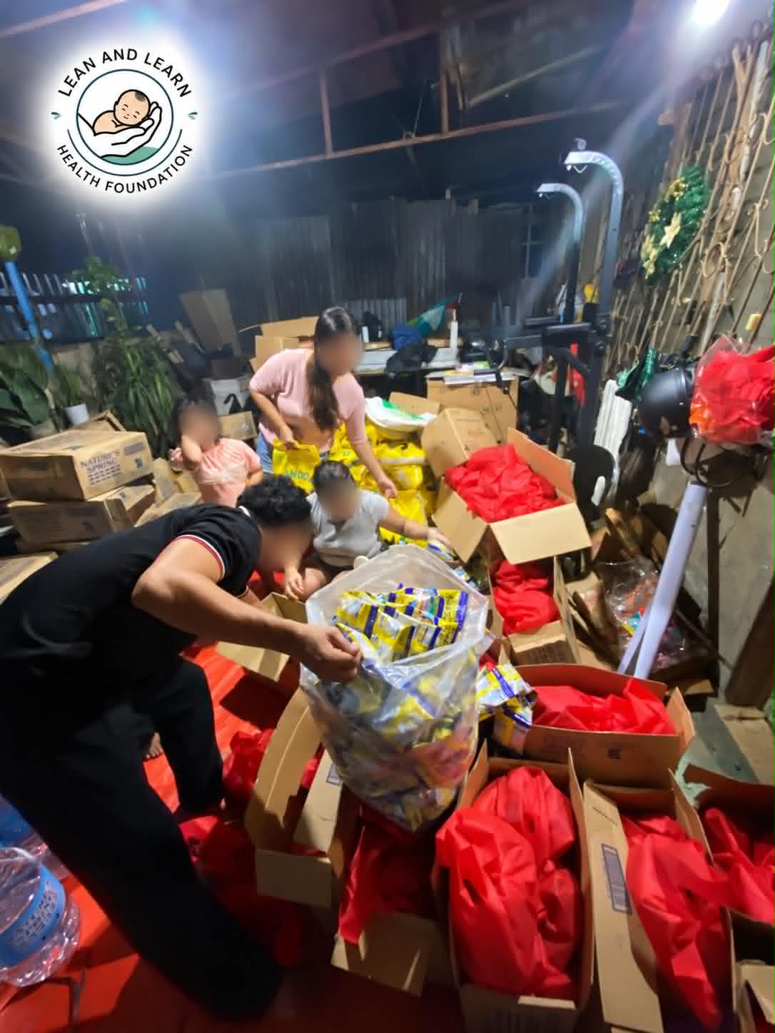 Volunteers preparing relief supplies and red bags